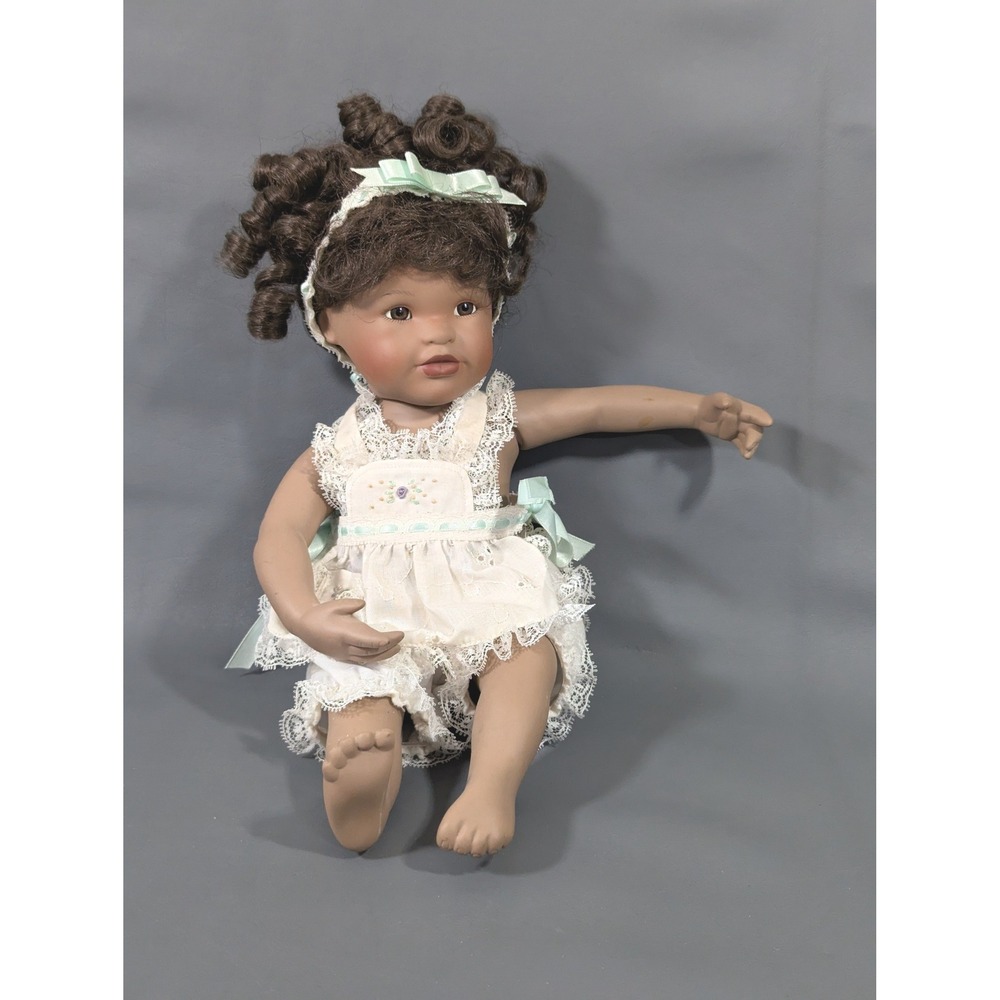 Vintage Seated Porcelain Baby Doll Brown Eyes Curly Hair Lace Romper 10"